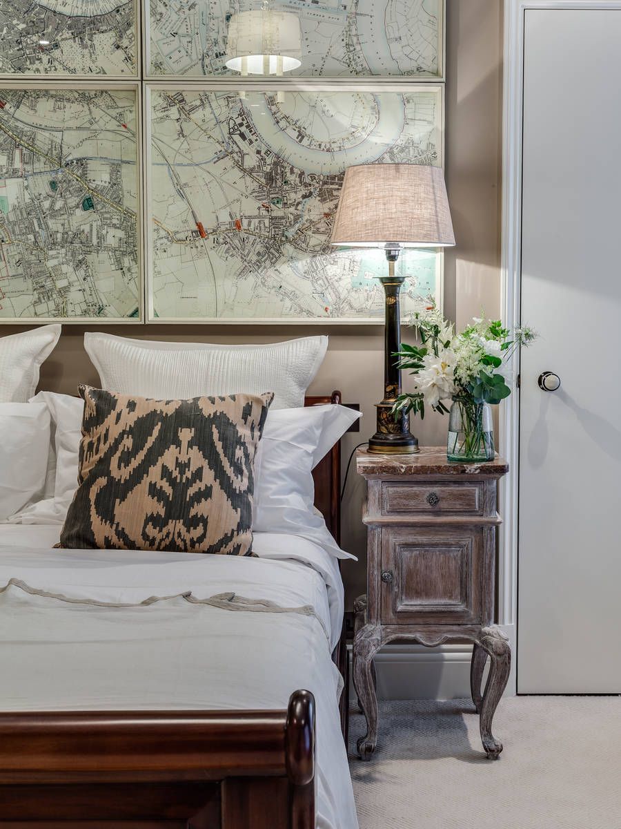 Turn the headboard wall into a work of art using gorgeous framed maps