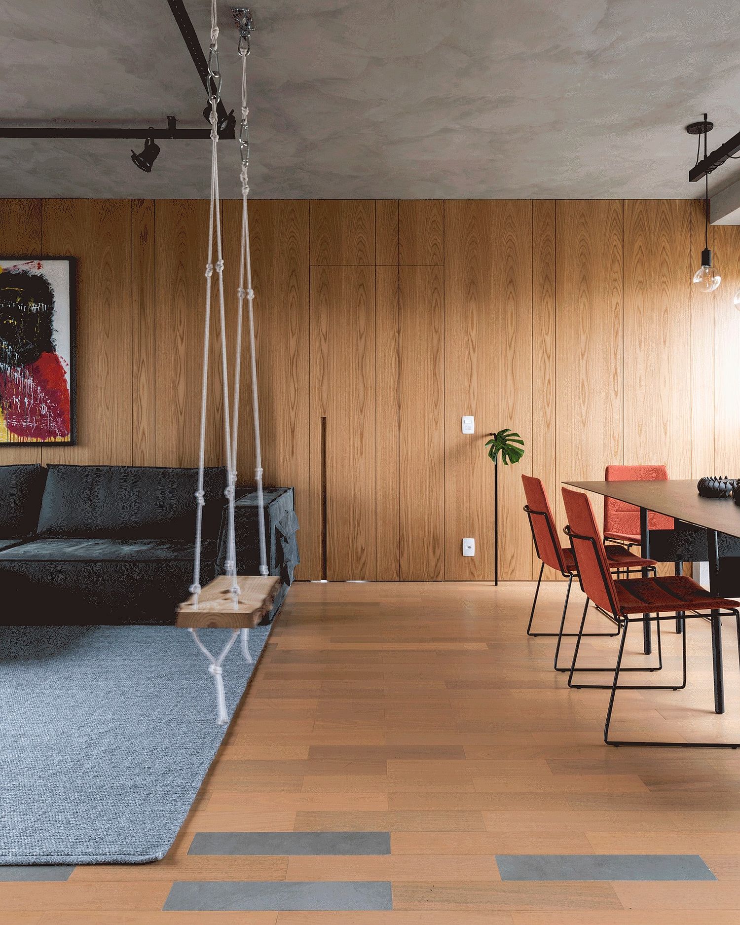 Using wooden floor and accent walls in the modern apartment living room in style