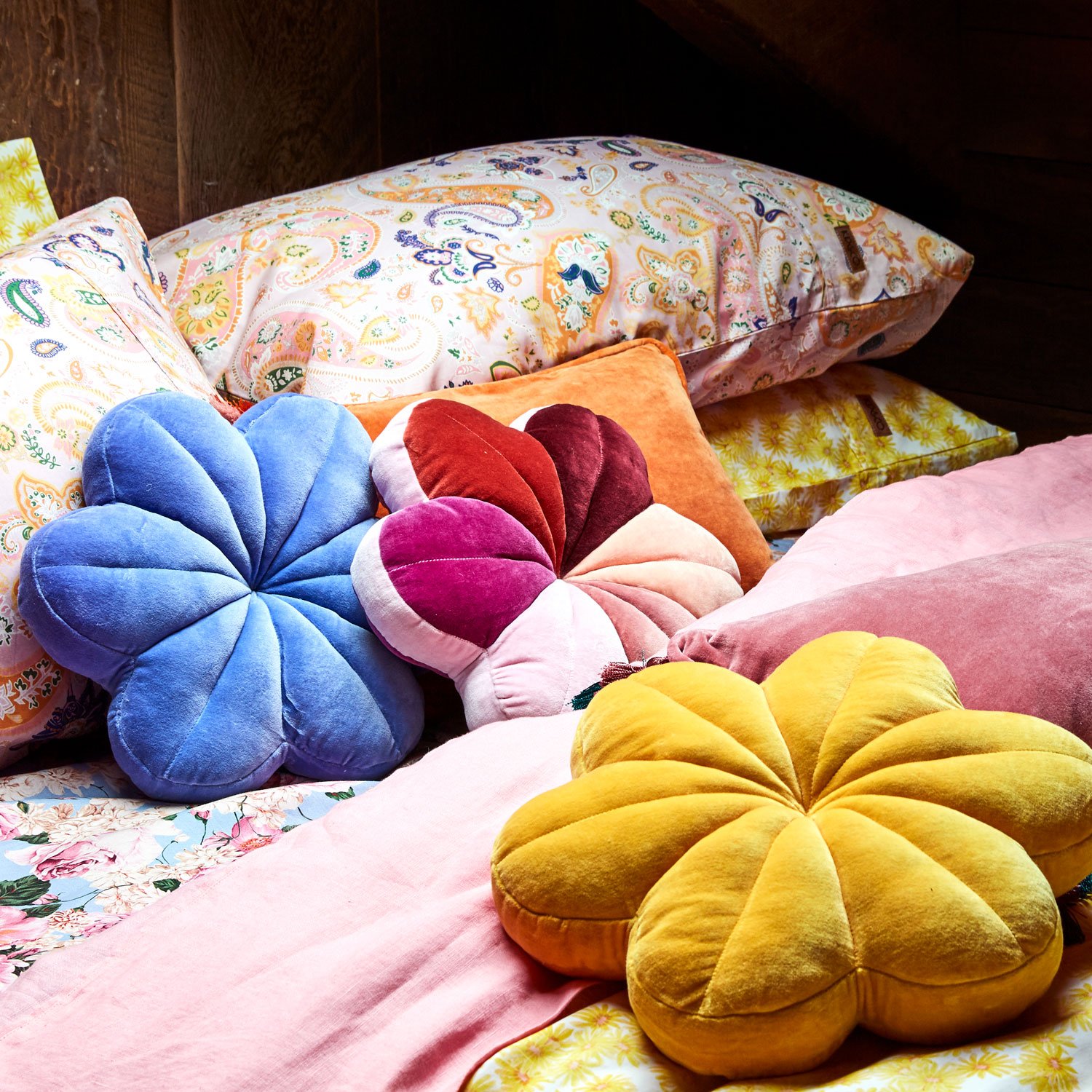 Velvet floral pillows in bright colors