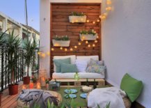 Wall-mounted-planters-coupled-with-string-lights-to-shape-a-beautiful-backdrop-16113-217x155