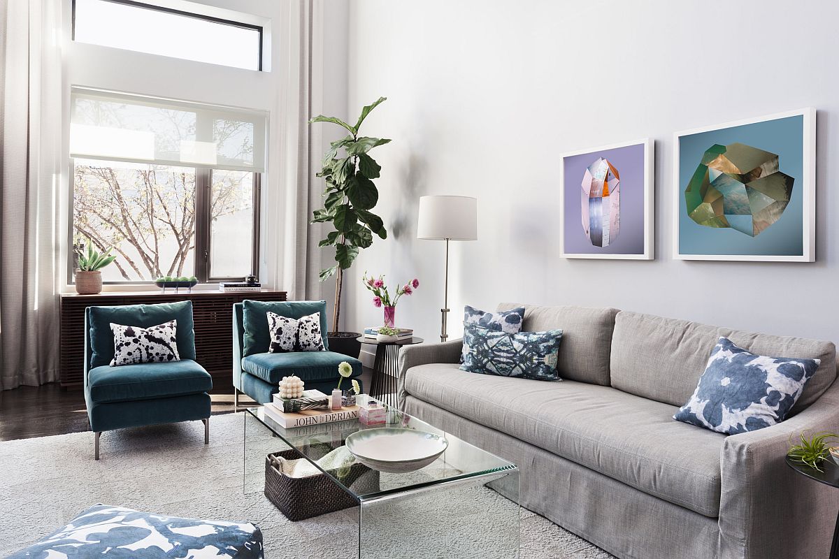 White-living-area-with-large-gray-couch-and-green-accents-all-around-79929
