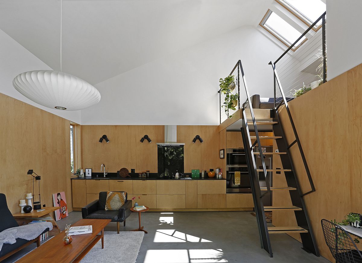 Wood and white along with heated concrete floors shape the interior of the house