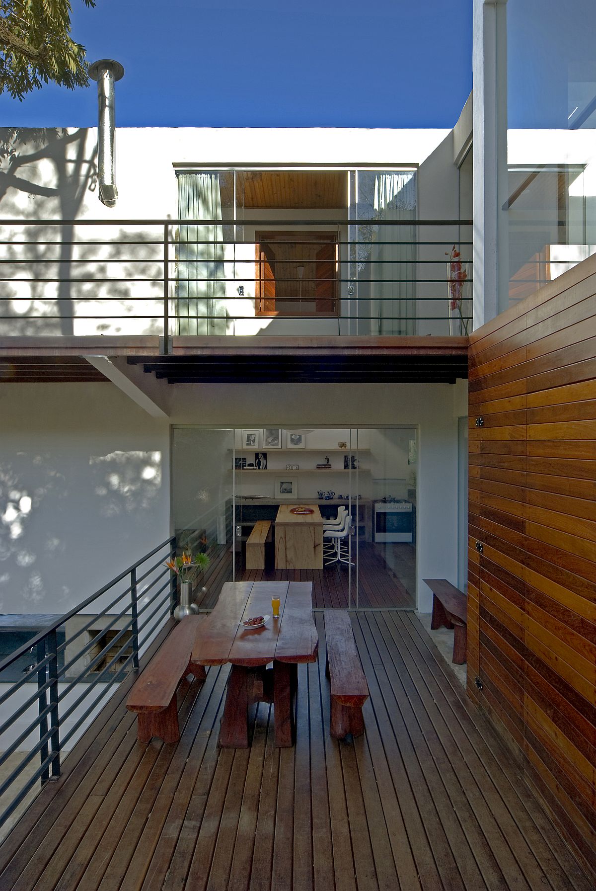 Wooden decks integrate different blocks of the house and also offer outdoor spaces