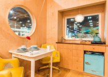Breakfast-area-and-home-workspace-are-both-the-same-in-this-tiny-mobile-home-with-walls-in-wood-59959-217x155