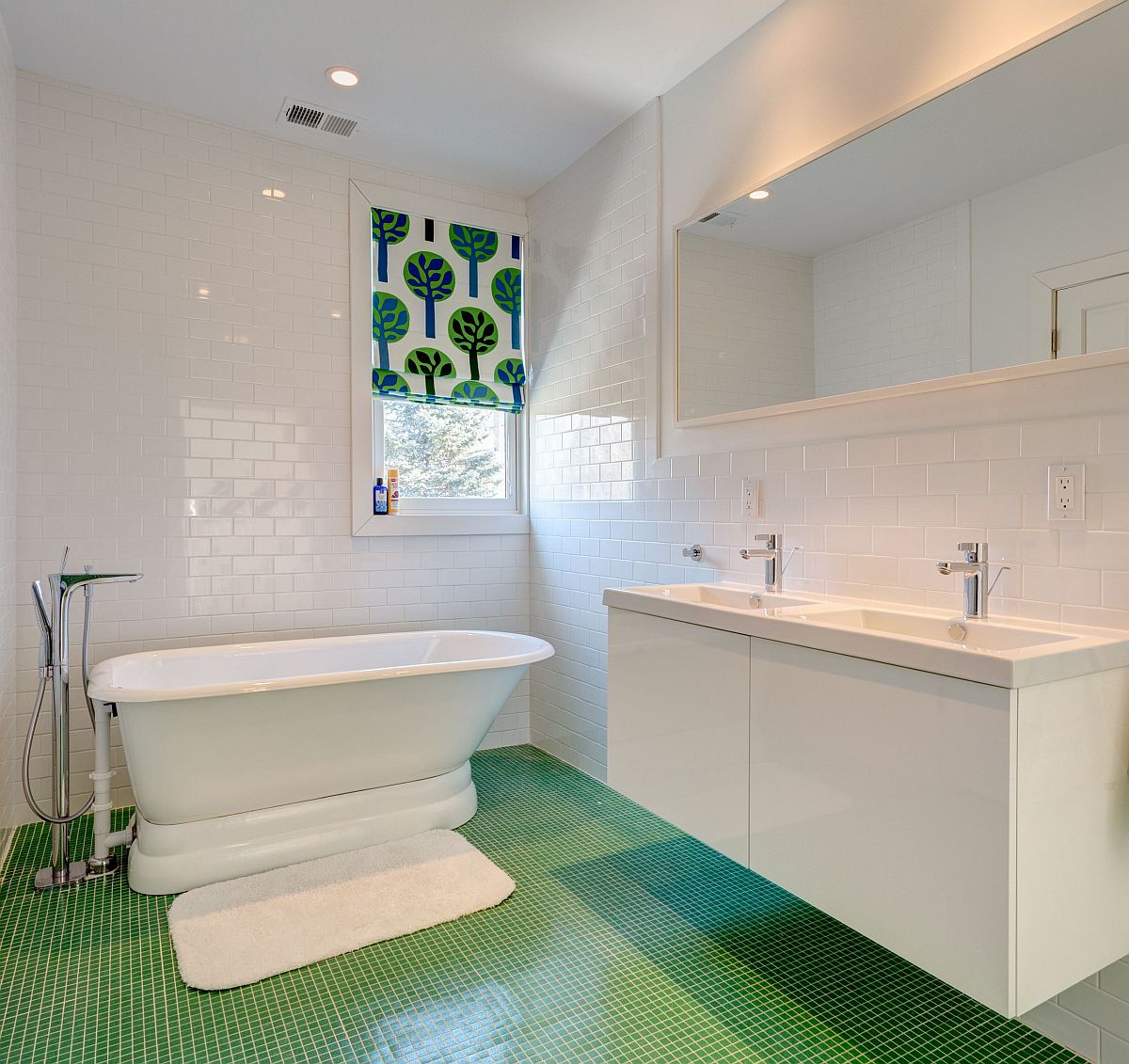 Contemporary bathroom of New York home in white with green tiled floor and accent window covering