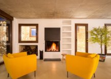 Contemporary-living-area-of-the-house-with-bright-yellow-chairs-and-a-fireplace-40574-217x155