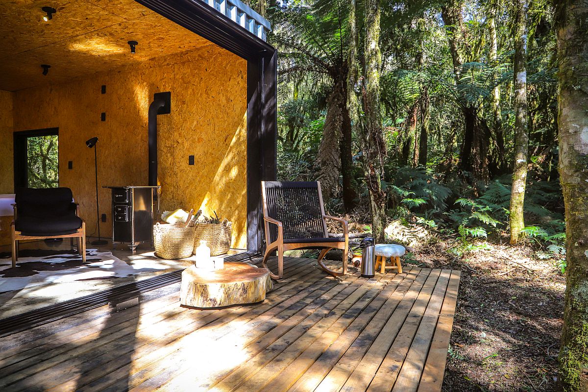 Cozy wooden panels and deck add a more naural vibe to the cabin-style vacation home