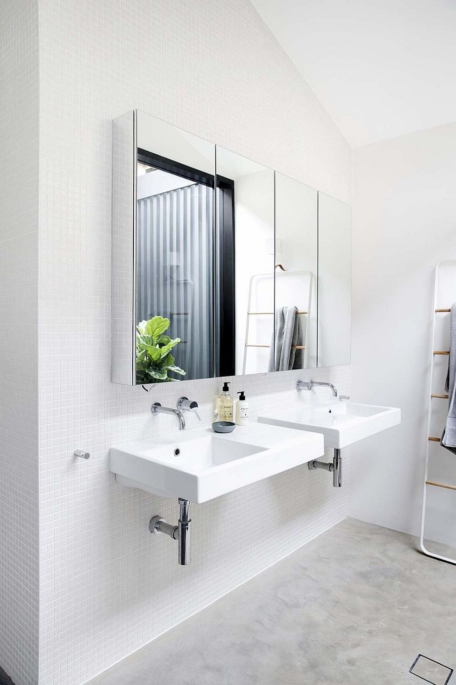 Create a more relaxing bathroom with walls in monochromatic white