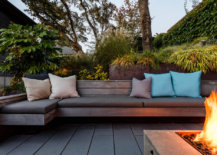 Custom-ipe-wood-benches-and-cushions-create-a-lovely-outdoor-sitting-area-52009-217x155