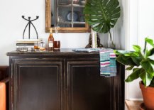 Decorating-the-large-wooden-credenza-in-the-living-room-with-a-touch-of-greenery-29829-217x155