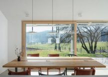 Dining-room-with-wooden-table-offers-fabulous-views-of-the-scenery-outside-95188-217x155