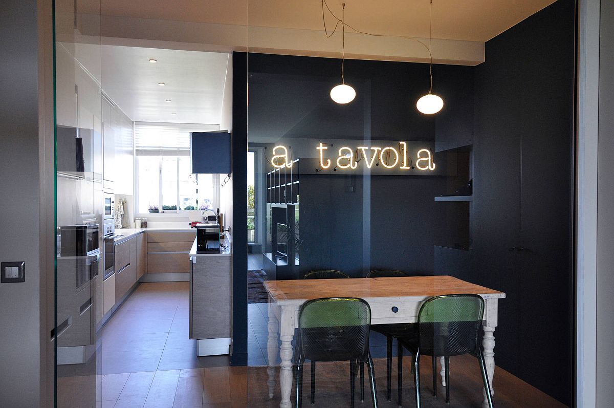 Eat-in kitchen of Paris apartment with a gorgeous neon sign