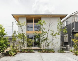 Japanese Home in Wood and White with Passive Heating and Cooling Techniques