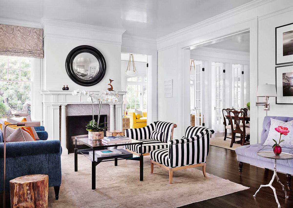Gorgeous-black-and-white-striped-accent-chairs-make-a-big-splash-in-this-traditional-living-room-of-home-in-Austin-19553