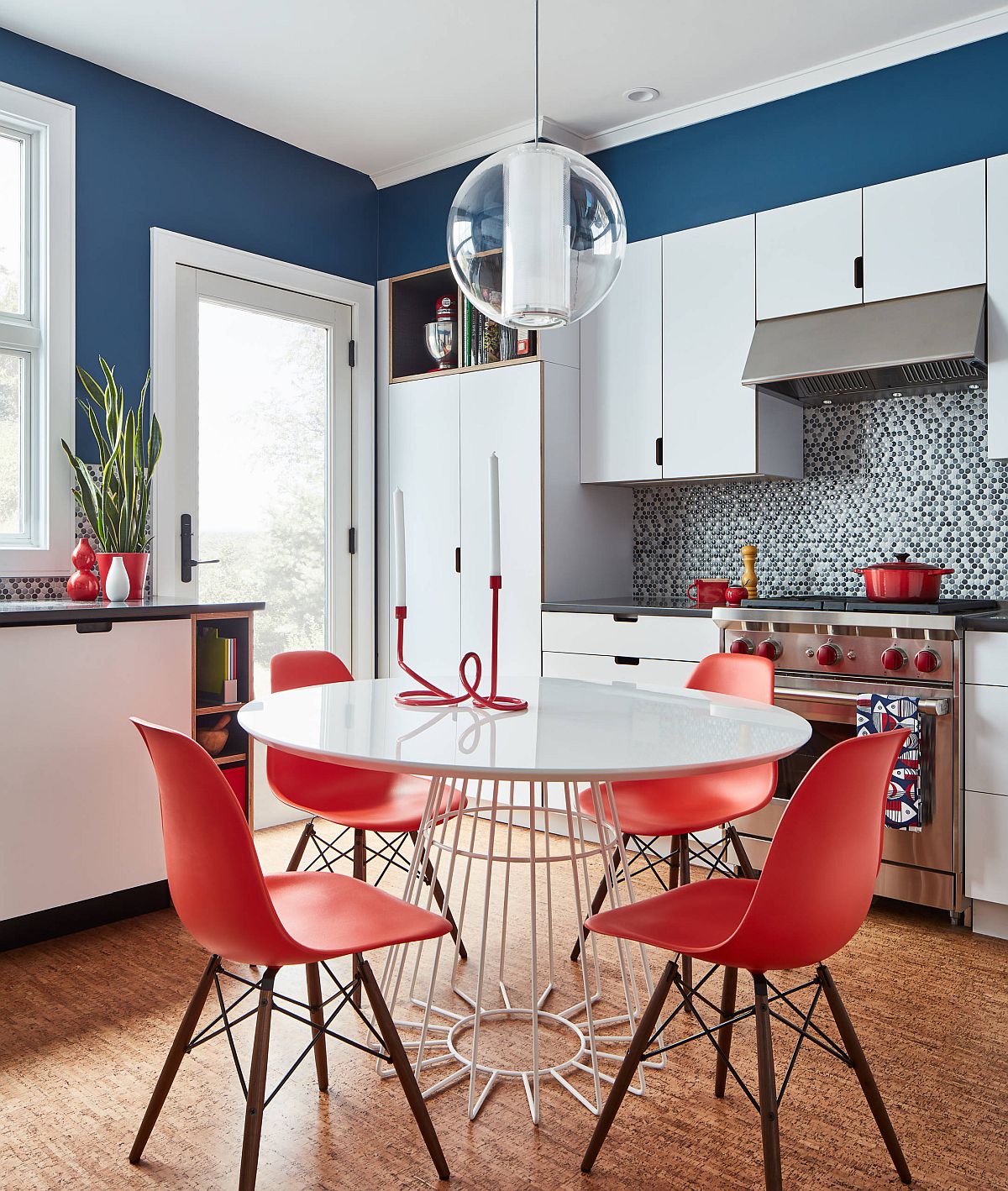 Gorgeous eat-in kitchen with white and blue color scheme and snazzy cork floor