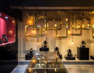 Rain of Gold: Stunning Jewelry Store Enchants in Breathtaking Black and Gold