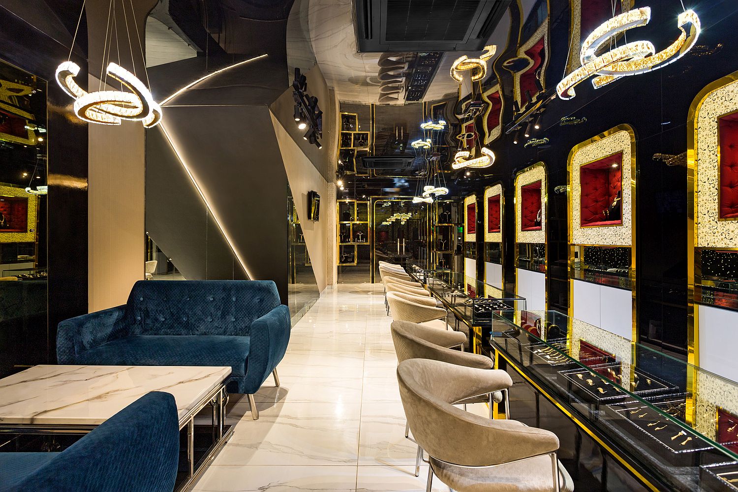 Interior of contemporary jewelry store in india in black, gold and a hint of red