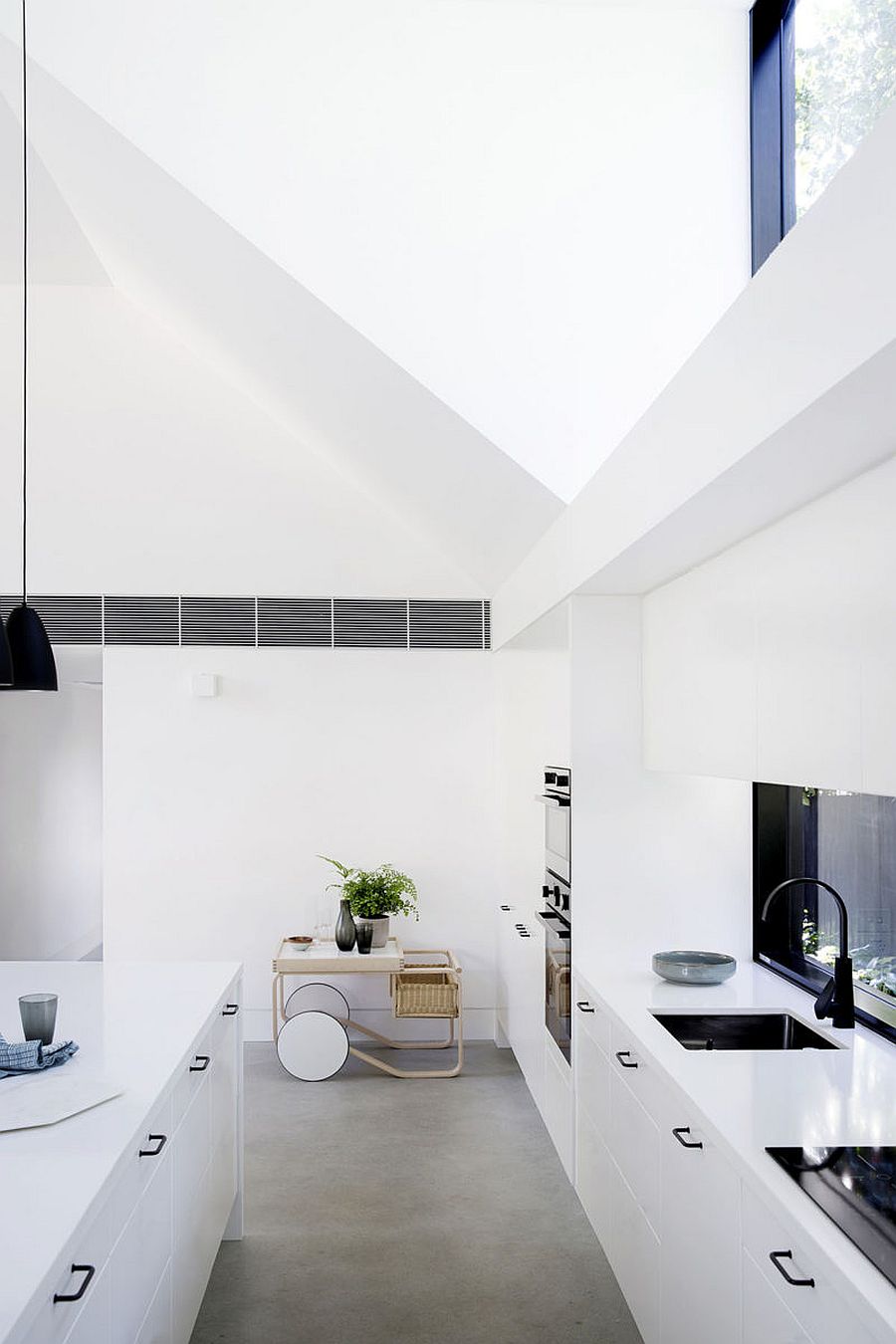 Kitchen of the house at the corner feels both modern and has a space-savvy design