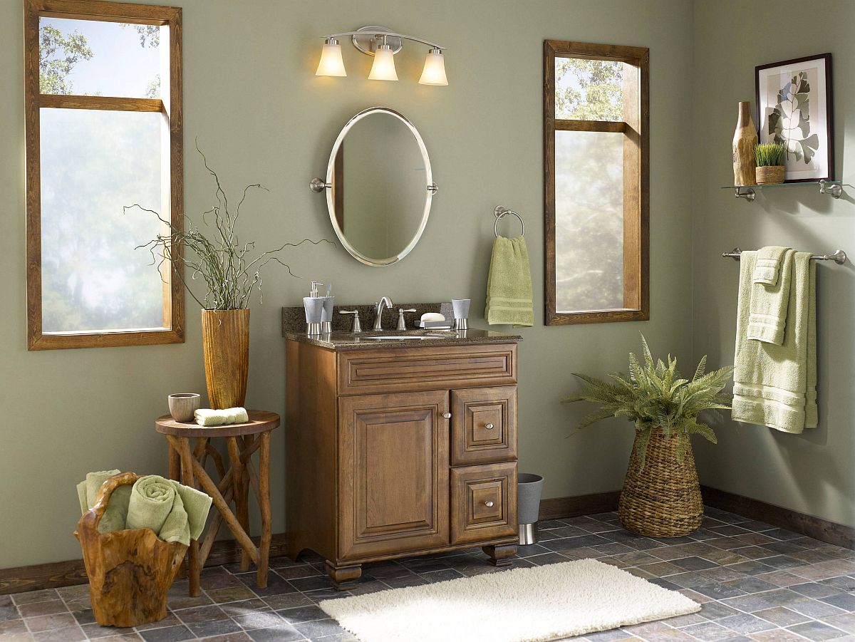 earth tones in bathroom with olive green walls