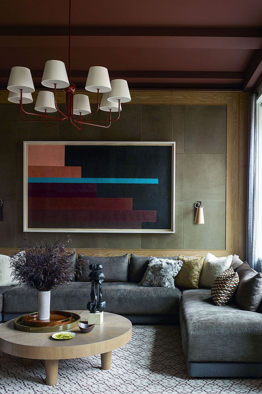 Living room with leather olive accent wall 