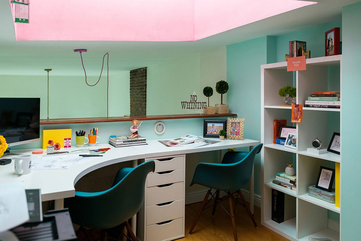 Loft level workspace with curved desk and ample shelf space