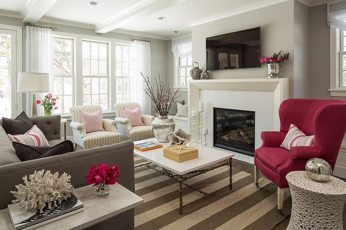 Lovely striped chairs in neutral colors blend in with the color sheme of the room