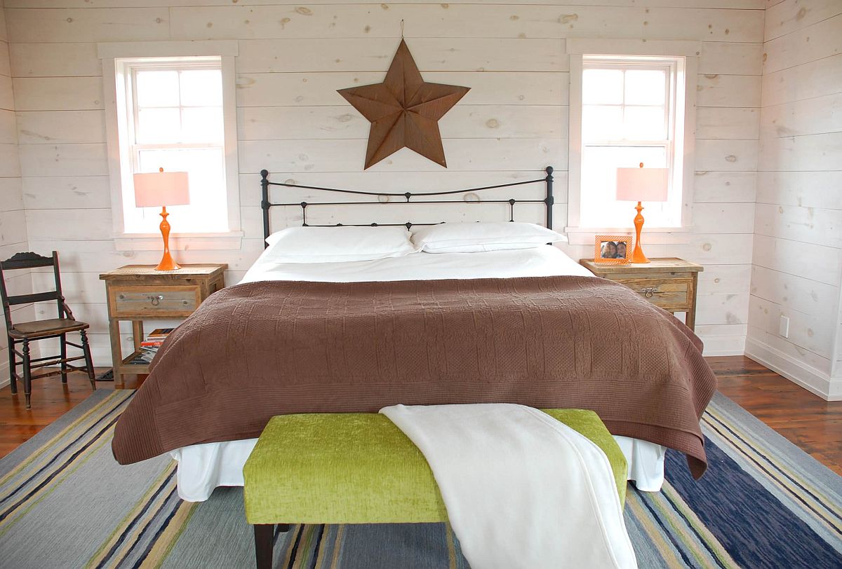 Modern eclectic bedroom with a neutral backdrop combined with colorful accents