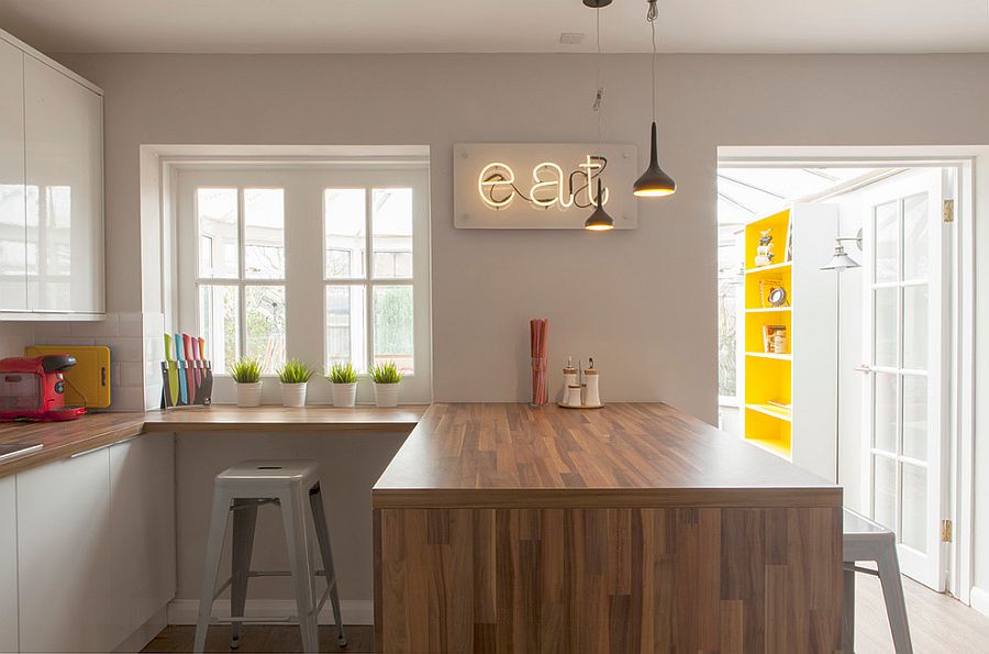 Modest modern kitchen in gray feels far more brighter thanks to the neon sign