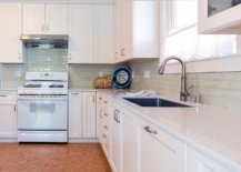 Modest-modern-kitchen-in-white-with-cozy-cork-floor-95245-217x155