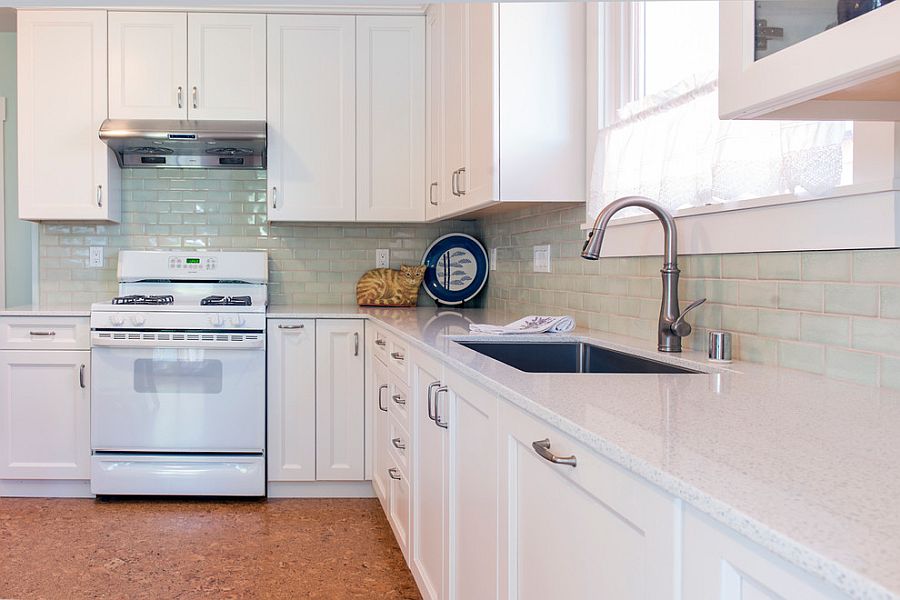 Modest modern kitchen in white with cozy cork floor