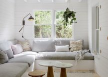 Muted-color-scheme-in-wood-and-white-along-with-metallic-accents-shape-the-living-room-31777-217x155