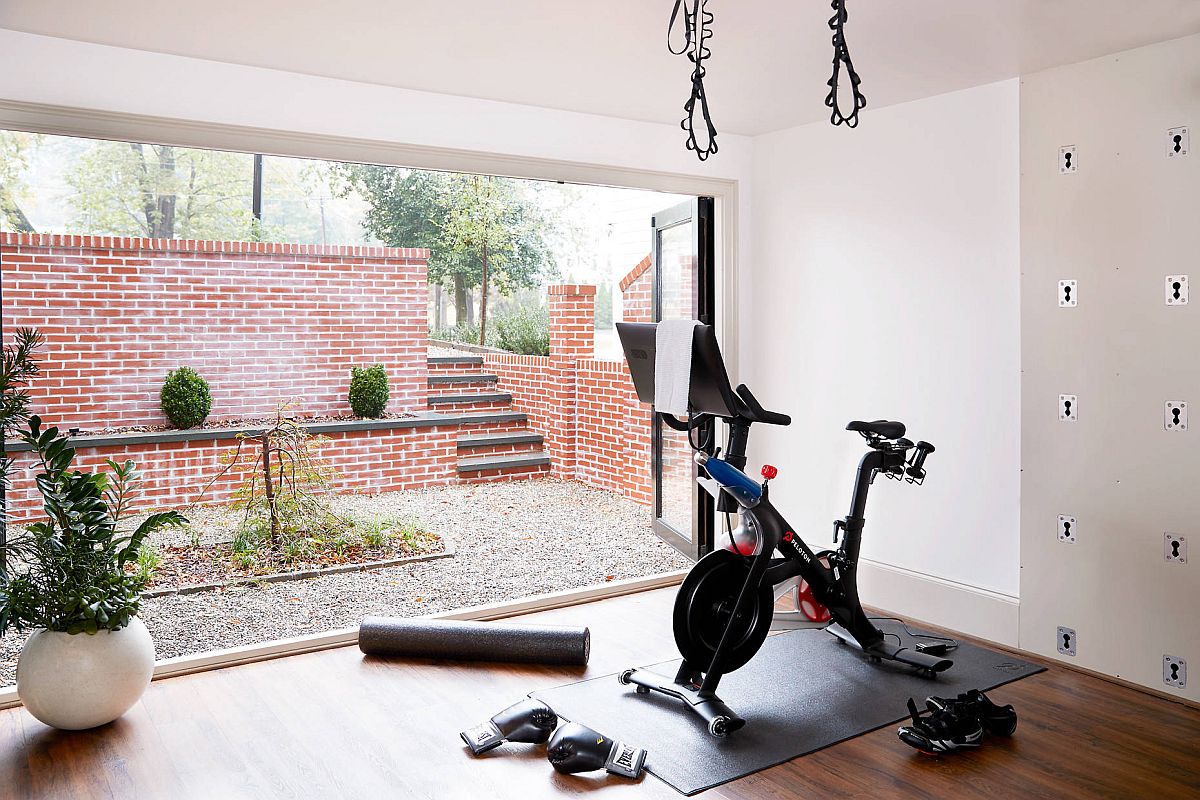 Opening up the living area brings fresh air into the makeshift home gym