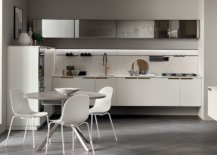 Refined-modern-kitchen-in-white-with-a-white-round-dining-table-chairs-and-upper-shelves-featuring-translucent-glass-doors-88137-217x155