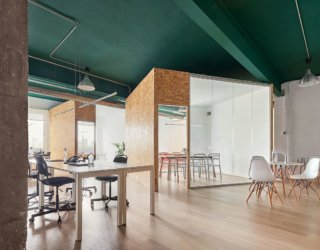 Recyclable Materials Shape a Modern Office Inside Industrial Building in Barcelona