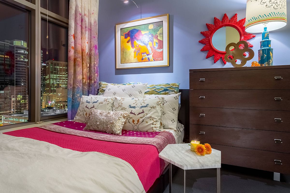 Skyline of Seattle becomes an integral part of this small bedroom narrative with eclectic style