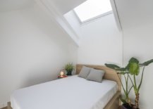Small-and-minimal-bedroom-of-the-attic-apartment-with-a-skylight-41719-217x155