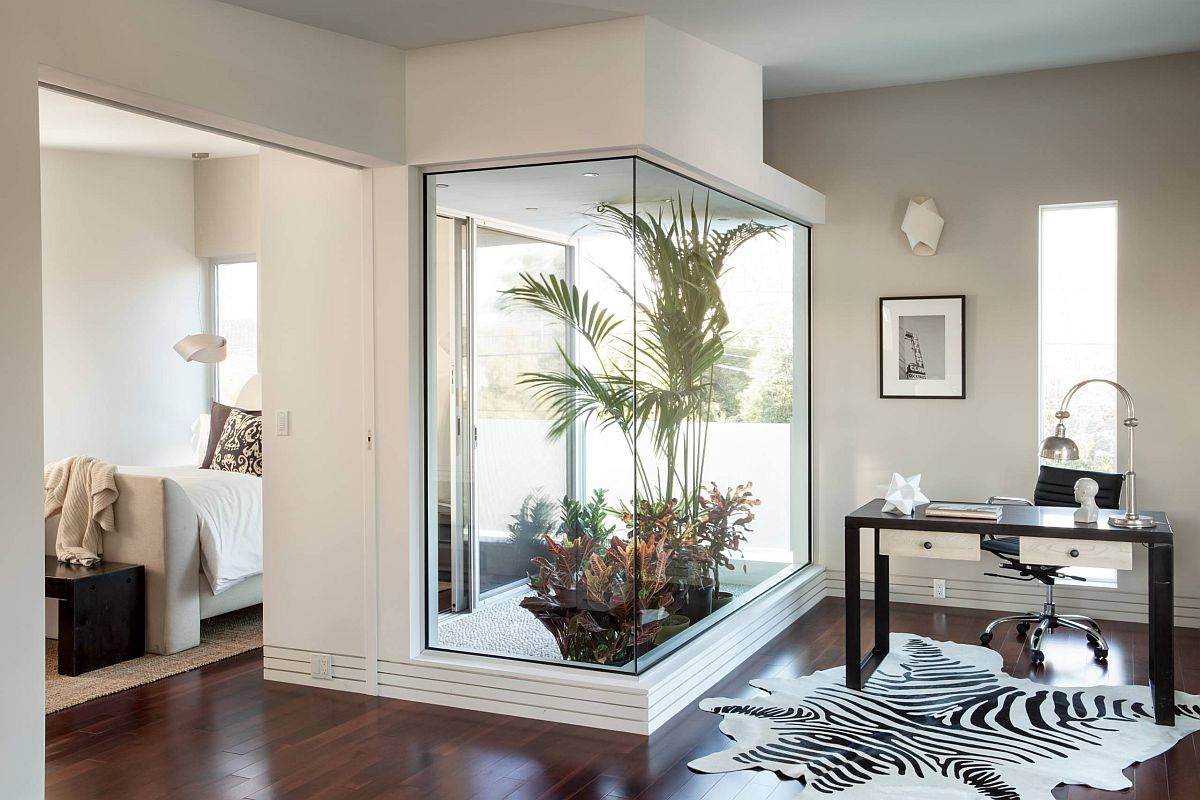 Small atrium brings light both into the bedoom and the home office on the other side