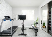 Small-home-gym-in-white-with-sliding-glass-door-cabinet-to-tuck-away-all-your-workout-equipment-37175-217x155
