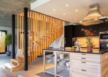 Smart-kitchen-and-a-wooden-staircase-next-to-it-inside-the-Spanish-holiday-house-17280-217x155