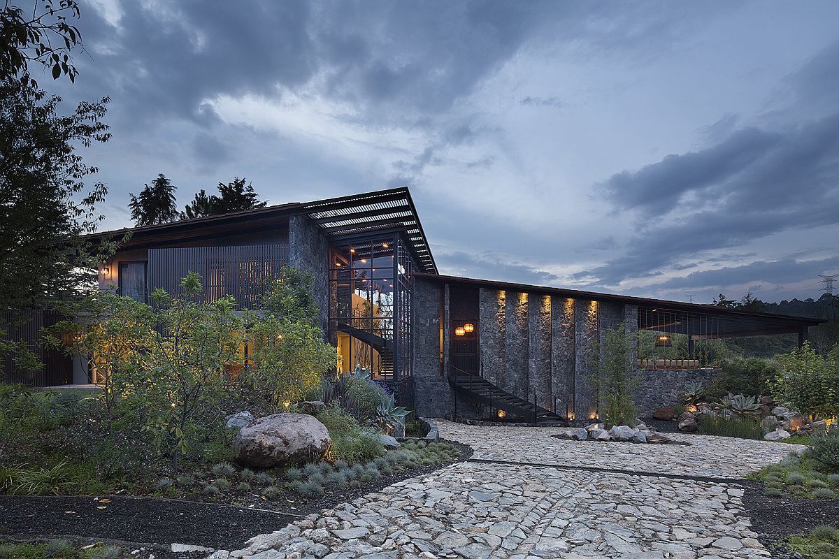 Stone walls and slanting roofs shape amazing LS House in Mexico