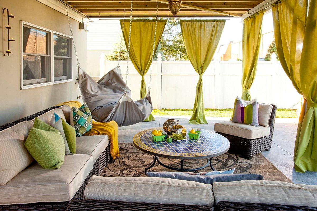 outdoor patio with bright olive green drapery