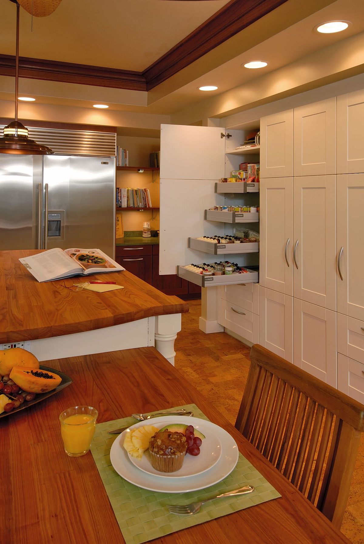 Tropical style kitchen with butcher block countertops and cork floors