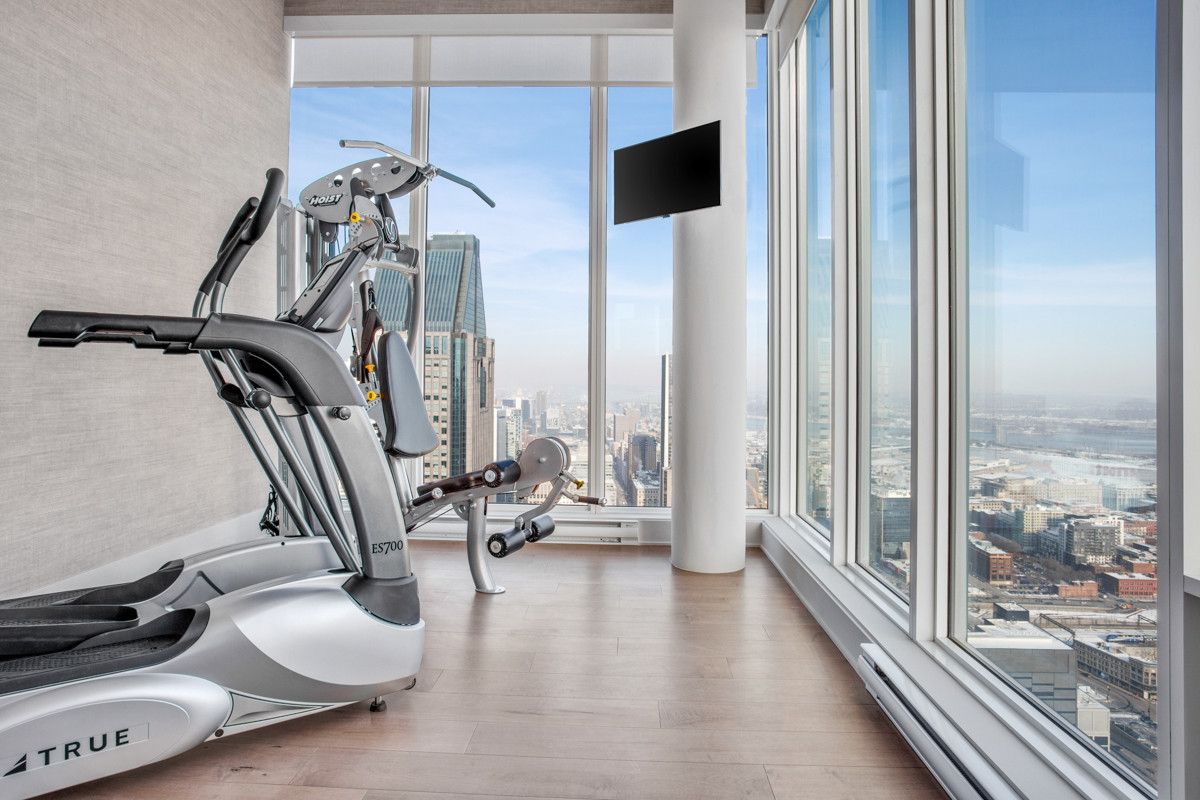 Turn the corner in the large room with amazing views and glass walls into a snazzy home gym