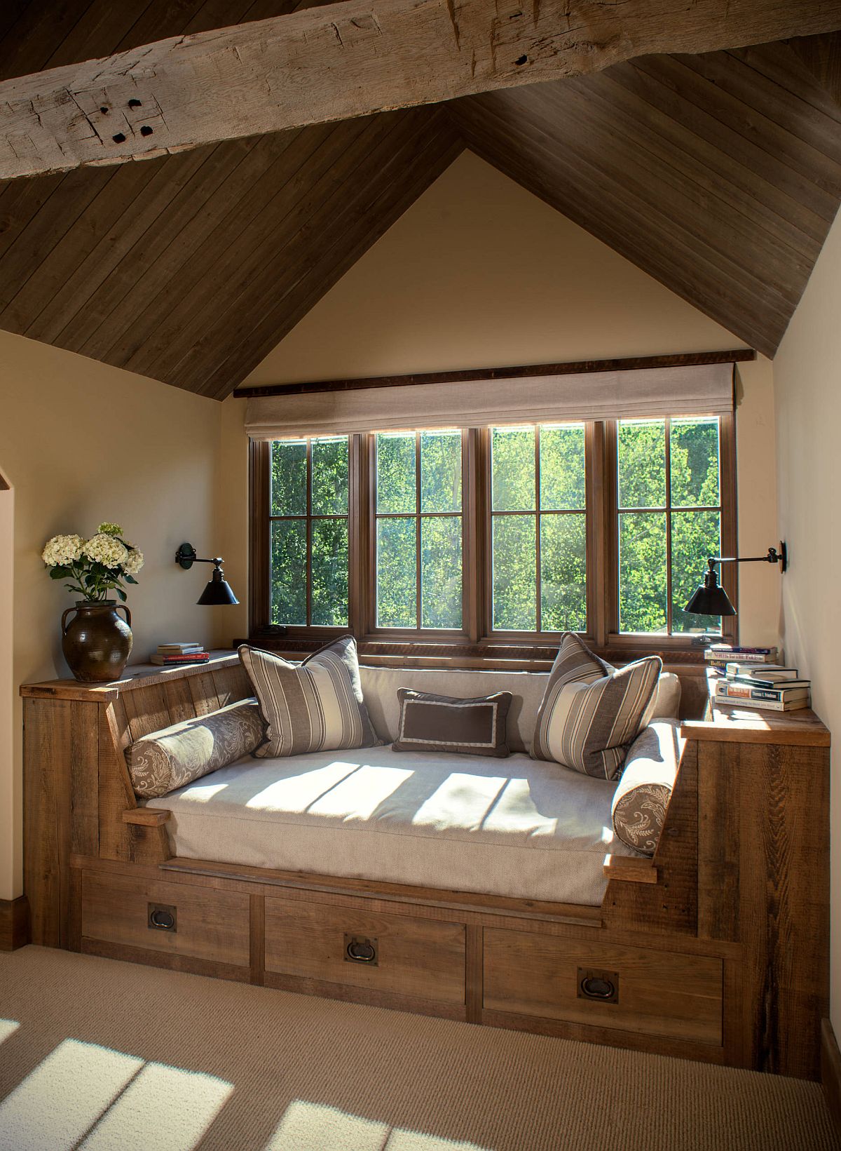 Turn the niche in the attic bedroom into a comfortable reading nook using built-in seating