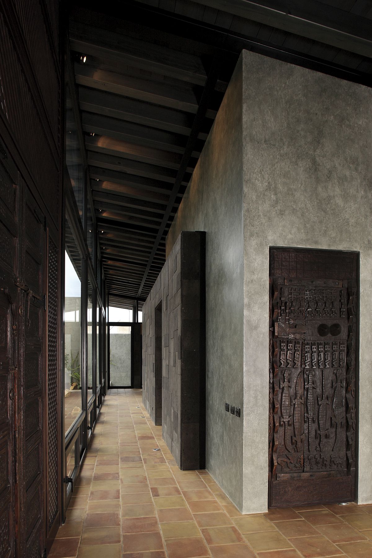 Unique woodwork and doors bring vernacular Mexican charm to the interior