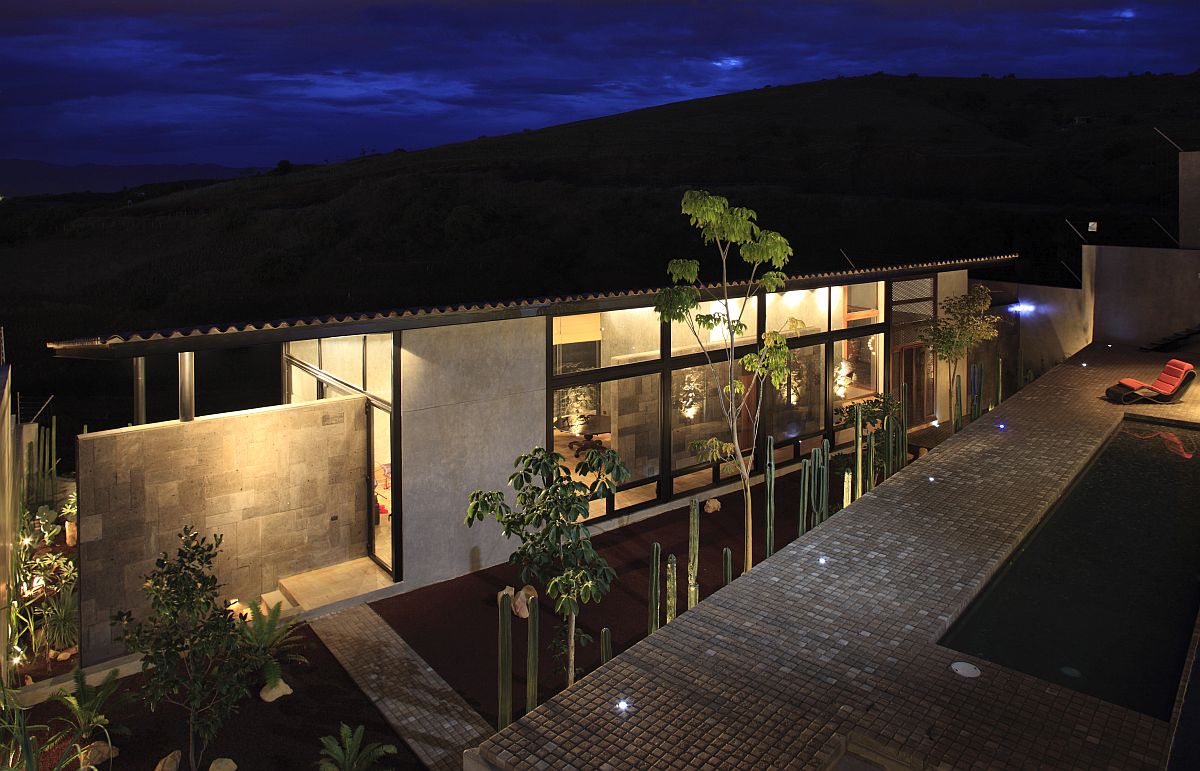 View of the garden, pool area and the house along with the distant valley