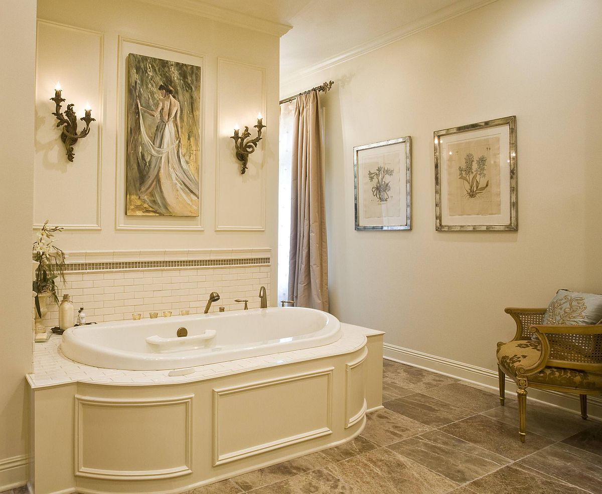 Wall art and framed botanical prints turn this classic bathroom into a trendy delight