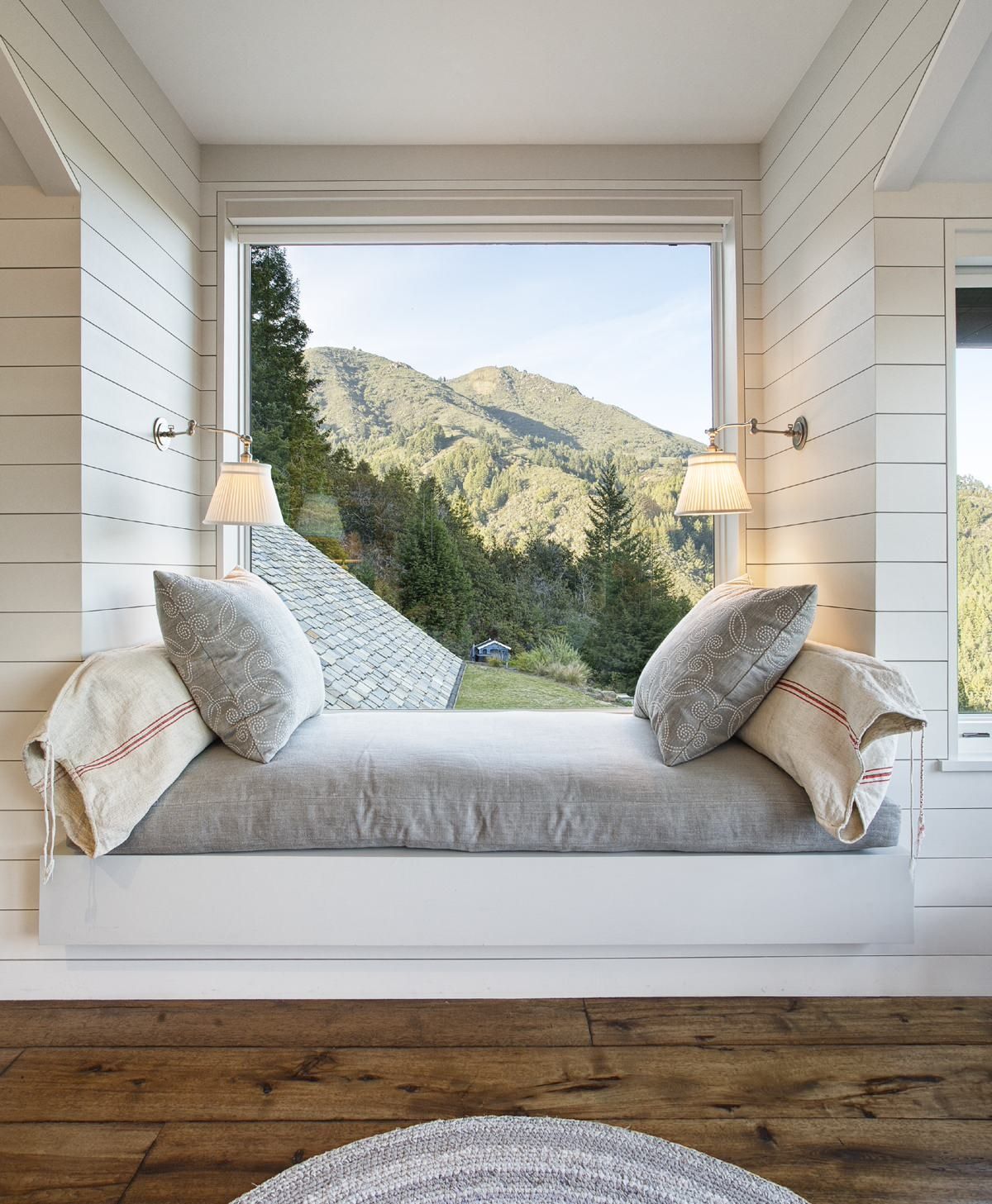 Window seats in the bedroom can offer picturesque views of the landscape outside