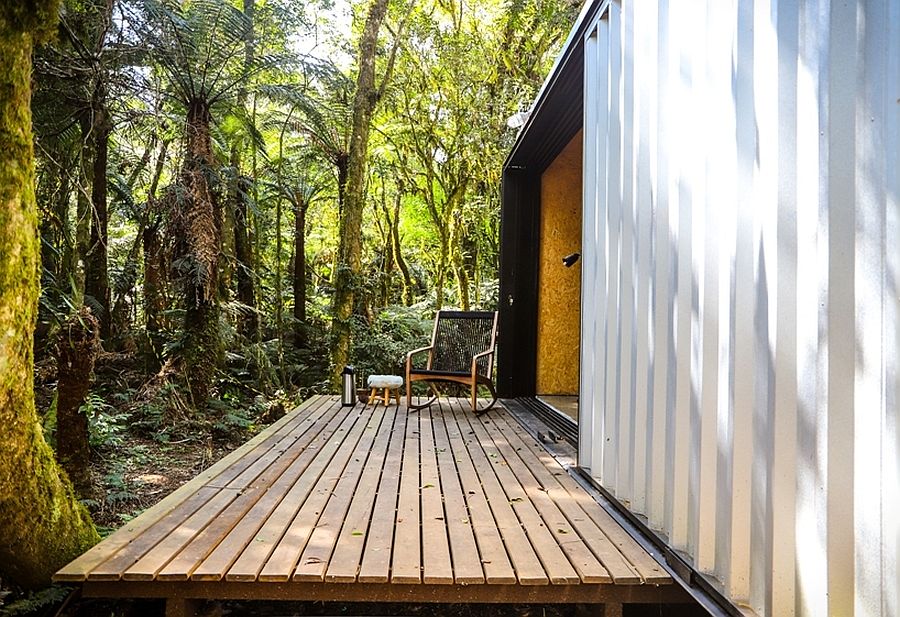 Wooden deck gently floats above ground and allows the homeowners to enjoy the sights and sounds outside