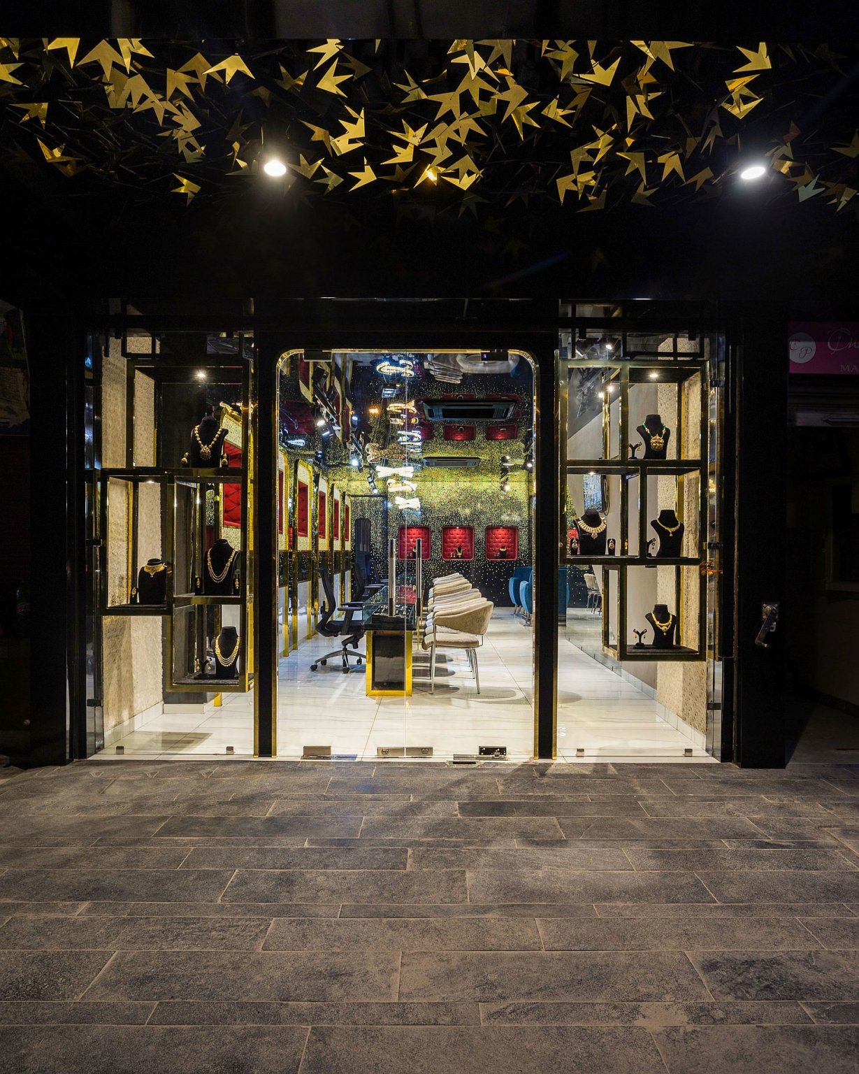 Rain of Gold Stunning Jewelry Store Enchants in Breathtaking Black and